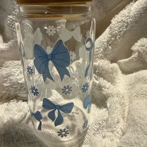 Decorative Glass Tumbler with Blue and White Bow Accents